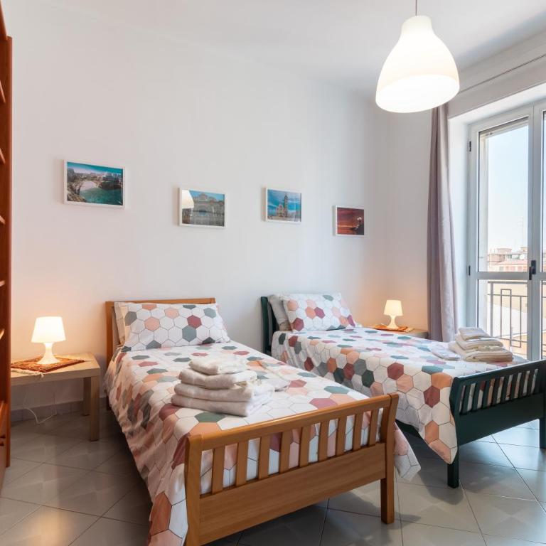 Chicca Casa Vacanze - Appartamento Deluxe con 2 Camere da Letto e Balcone - 18