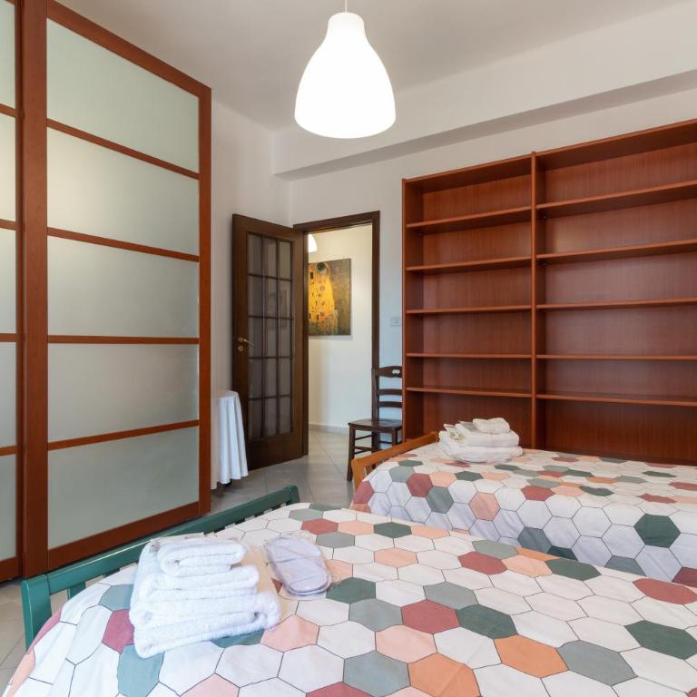 Chicca Casa Vacanze - Appartamento Deluxe con 2 Camere da Letto e Balcone - 20