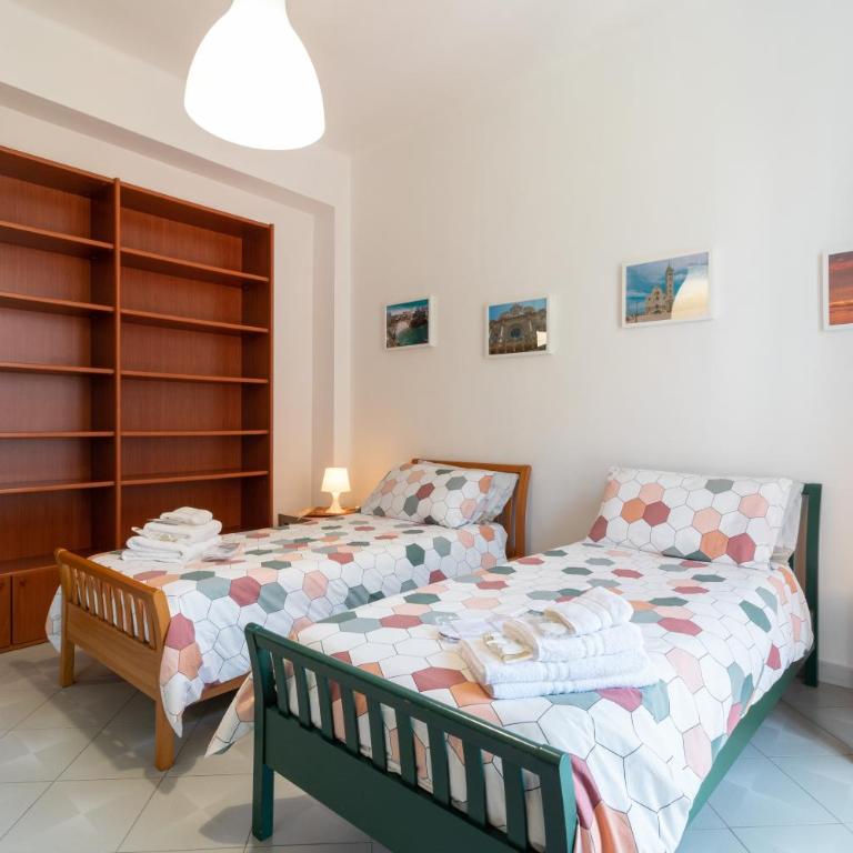 Chicca Casa Vacanze - Appartamento Deluxe con 2 Camere da Letto e Balcone - 21