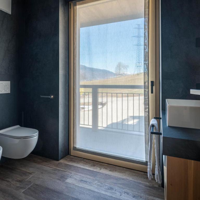 Arnica Alpin Lodge - Deluxe-Apartment mit 2 Schlafzimmern und Gartenblick - 10