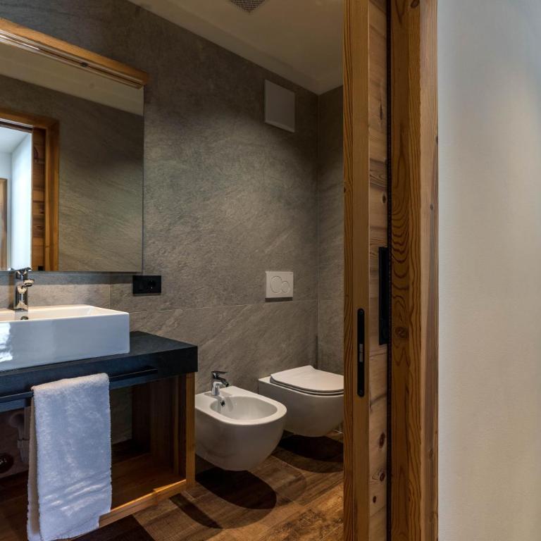 Arnica Alpin Lodge - Deluxe-Apartment mit 2 Schlafzimmern und Gartenblick - 10