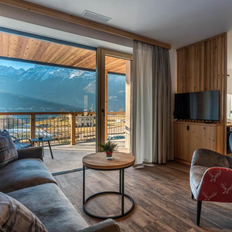 Arnica Alpin Lodge - Deluxe-Apartment mit 2 Schlafzimmern und Gartenblick - 7