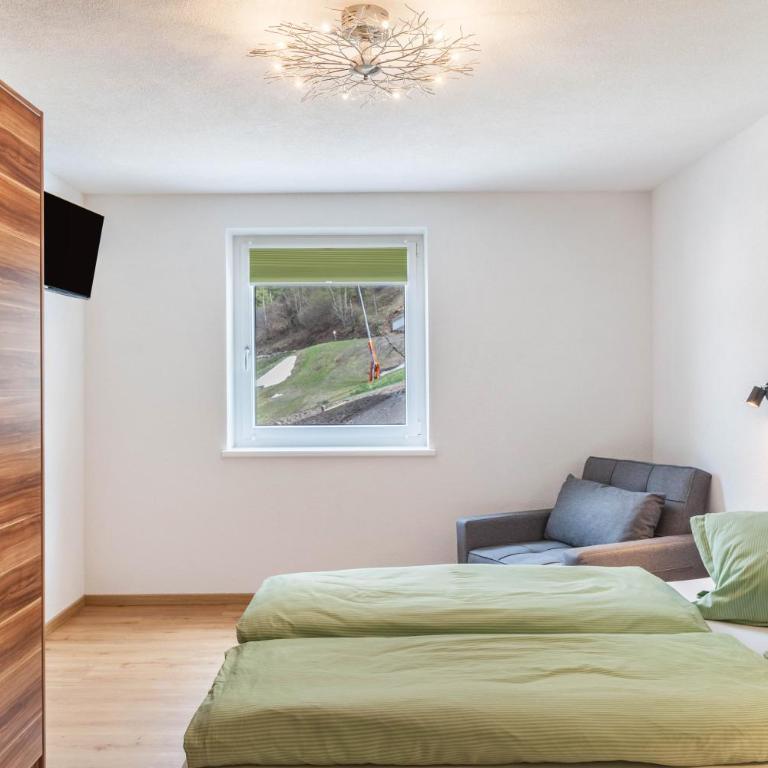 Haus Florian Ski-in and Ski-out - Deluxe-Apartment mit 2 Schlafzimmern und Gartenblick - 9