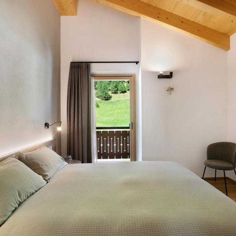 Botton d'oro Camping Stella Alpina - Appartamento Deluxe con 2 Camere da Letto e Vista Giardino - 9