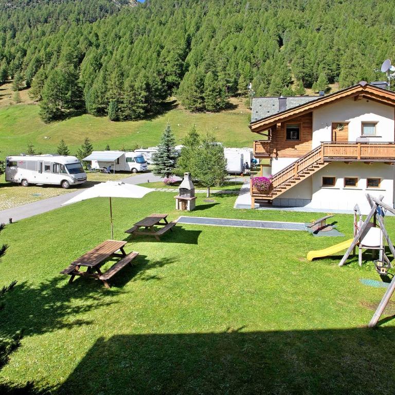 Botton d'oro Camping Stella Alpina - Appartamento Deluxe con 2 Camere da Letto e Vista Giardino - 23