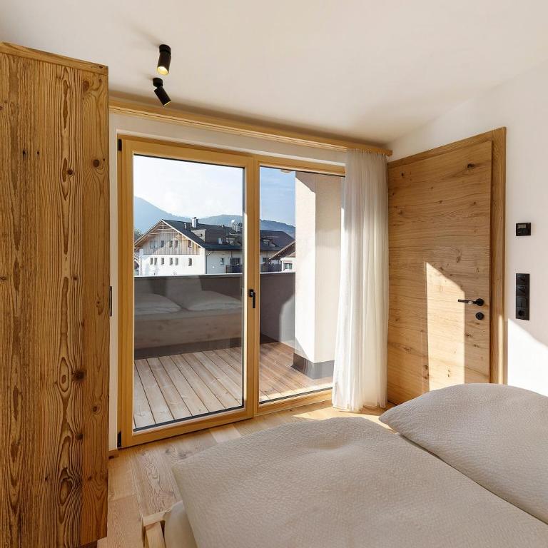 Apartments Schlernheim - Appartamento Deluxe con 2 Camere da Letto e Vista Giardino - 10