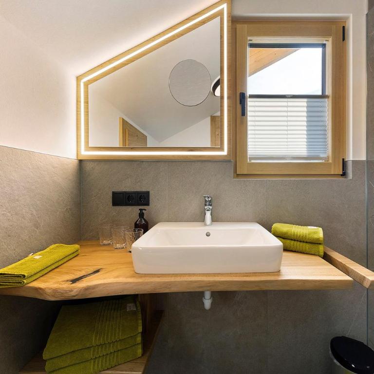 Apartments Schlernheim - Appartamento Deluxe con 2 Camere da Letto e Vista Giardino - 16
