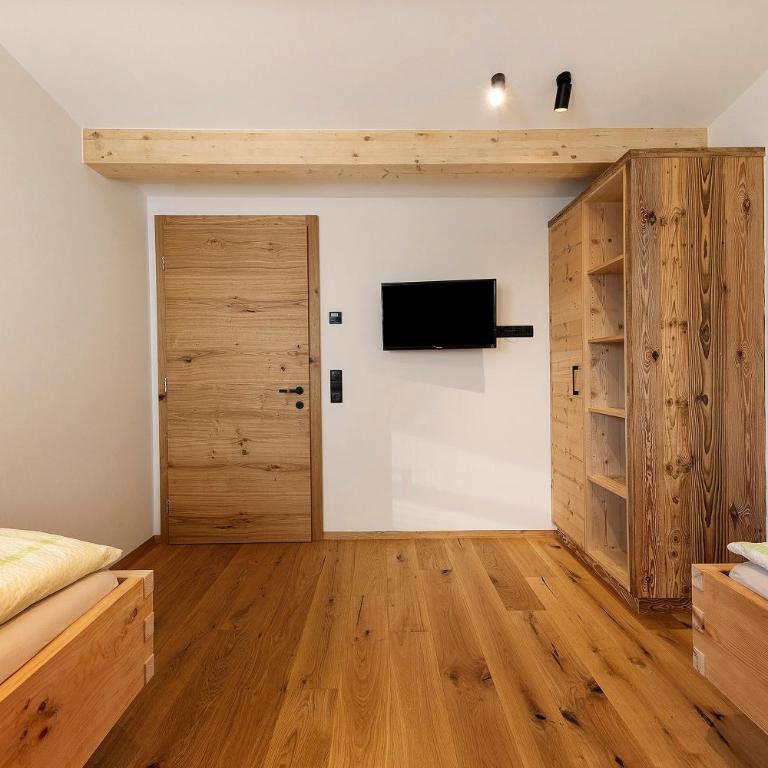 Apartments Schlernheim - Appartamento Deluxe con 2 Camere da Letto e Vista Giardino - 15