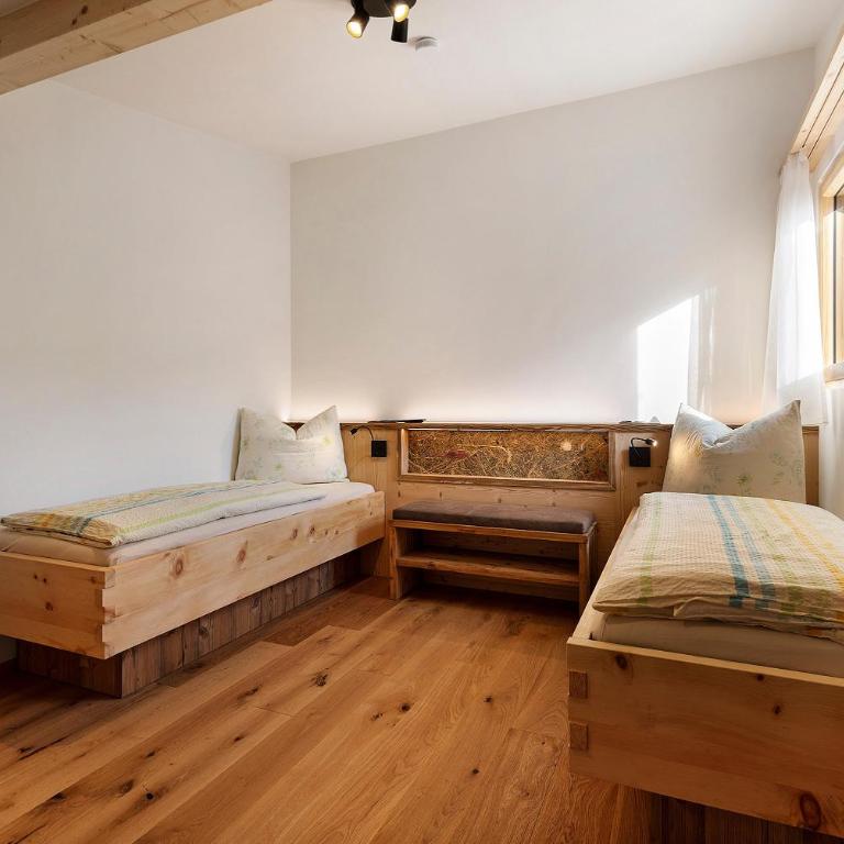 Apartments Schlernheim - Appartamento Deluxe con 2 Camere da Letto e Vista Giardino - 11
