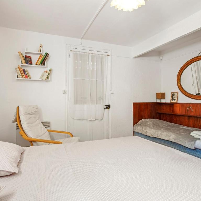 Appartement avec clim et terrasse - Appartamento Deluxe con 2 Camere da Letto e Vista Giardino - 14