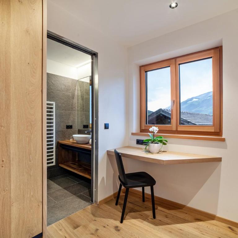 Huetterhof Apartement Winter - Deluxe-Apartment mit 2 Schlafzimmern und Gartenblick - 13