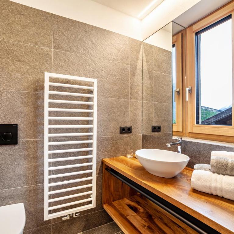 Huetterhof Apartement Winter - Deluxe-Apartment mit 2 Schlafzimmern und Gartenblick - 15