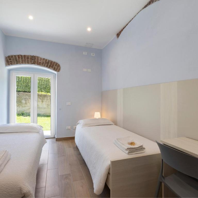 Ca di perti apt 1 - Appartamento Deluxe con 2 Camere da Letto e Vista Giardino - 16