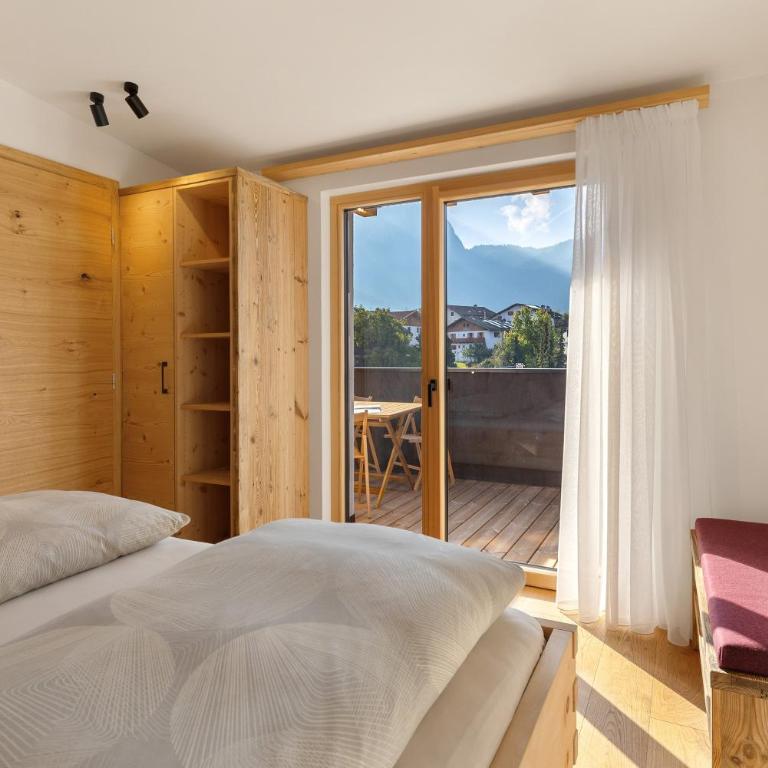 Apartments Schlernheim - Appartamento Deluxe con 2 Camere da Letto e Vista Giardino - 9