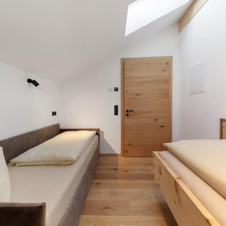 Apartments Schlernheim - Appartamento Deluxe con 2 Camere da Letto e Vista Giardino - 15