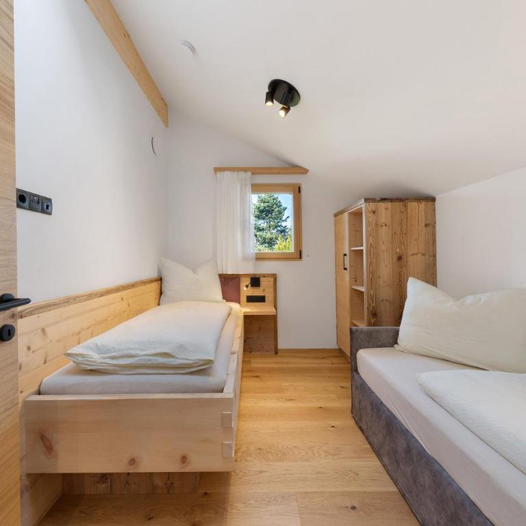 Apartments Schlernheim - Appartamento Deluxe con 2 Camere da Letto e Vista Giardino - 13