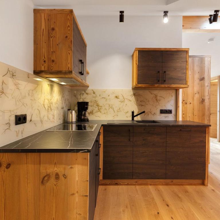 Apartments Schlernheim - Appartamento Deluxe con 2 Camere da Letto e Vista Giardino - 10
