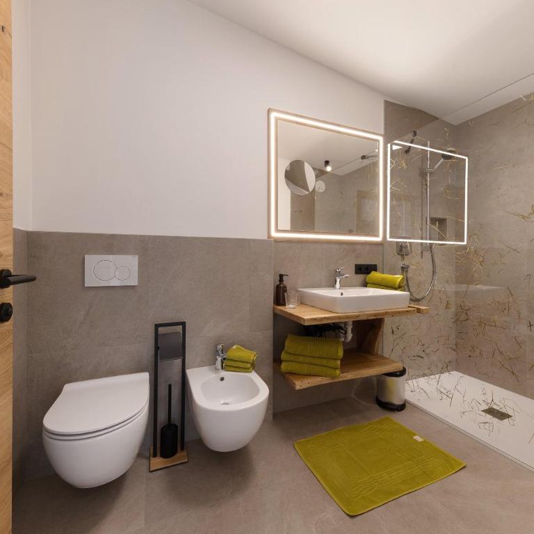 Apartments Schlernheim - Appartamento Deluxe con 2 Camere da Letto e Vista Giardino - 16