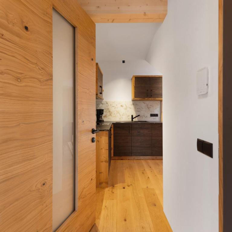 Apartments Schlernheim - Appartamento Deluxe con 2 Camere da Letto e Vista Giardino - 14