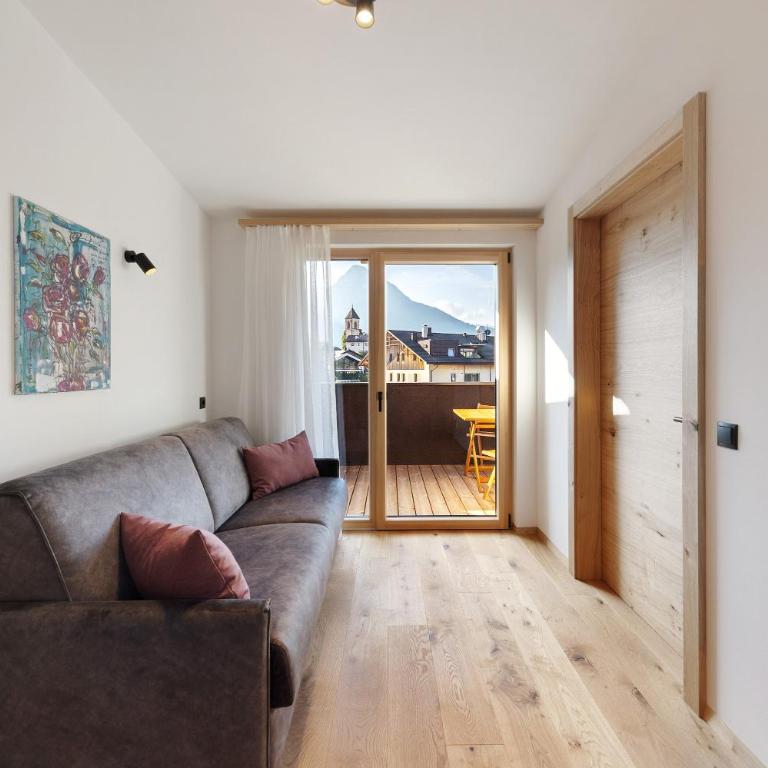 Apartments Schlernheim - Appartamento Deluxe con 2 Camere da Letto e Vista Giardino - 5