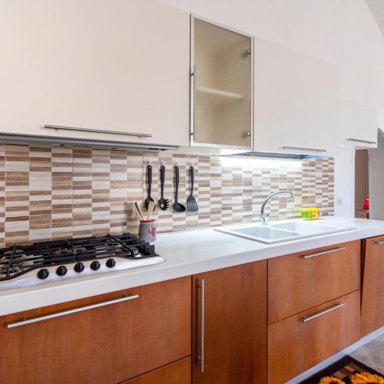 La casa di pietra location Rosy - Appartamento Deluxe con 2 Camere da Letto e Vista Giardino - 12