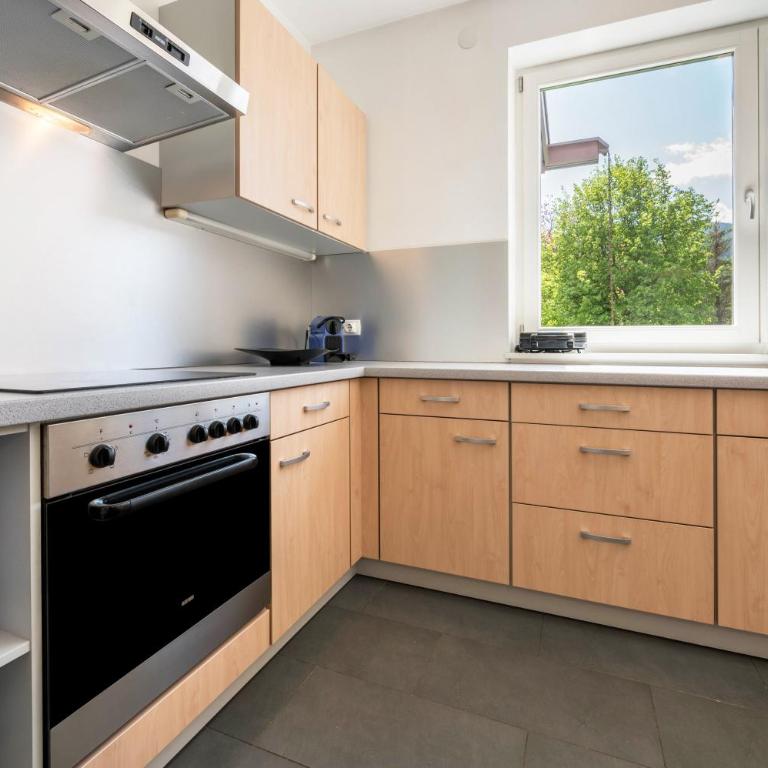 Suite Marianne - Appartamento Deluxe con 2 Camere da Letto e Vista Giardino - 11