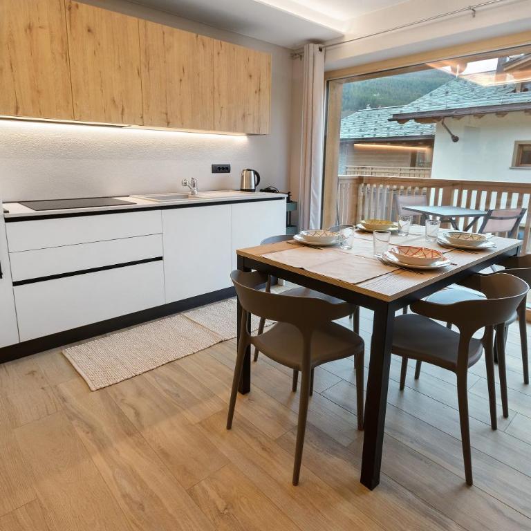 Appartamento Sbuffo Livigno - Appartamento Deluxe con 2 Camere da Letto e Vista Giardino - 7