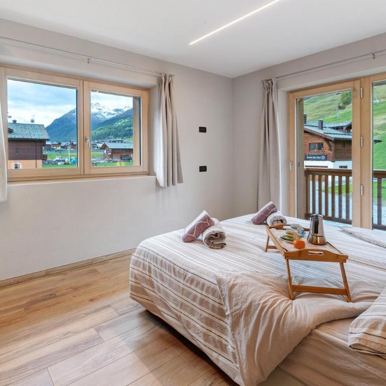 Appartamento Sbuffo Livigno - Appartamento Deluxe con 2 Camere da Letto e Vista Giardino - 16