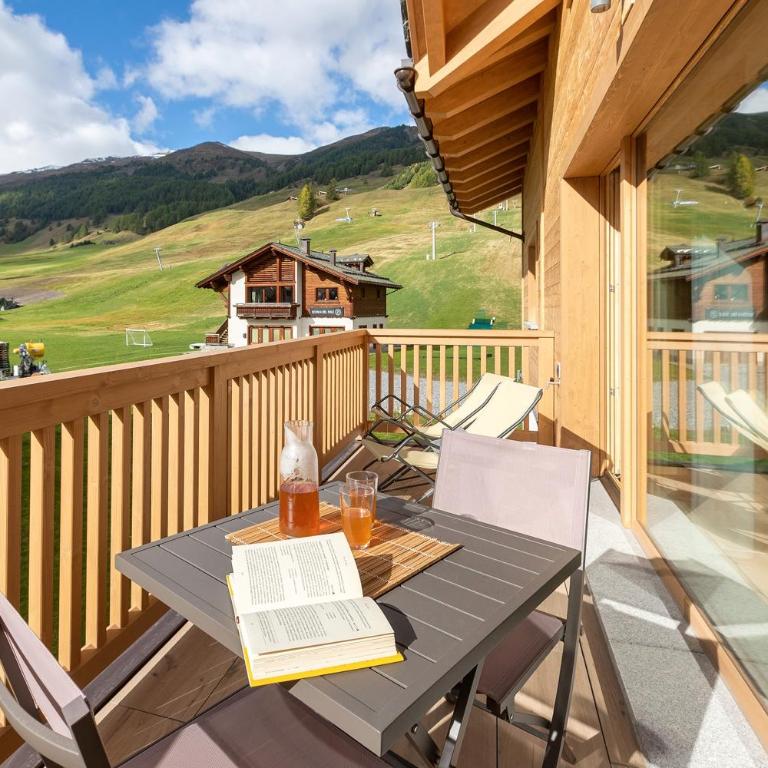 Appartamento Sbuffo Livigno - Appartamento Deluxe con 2 Camere da Letto e Vista Giardino - 1