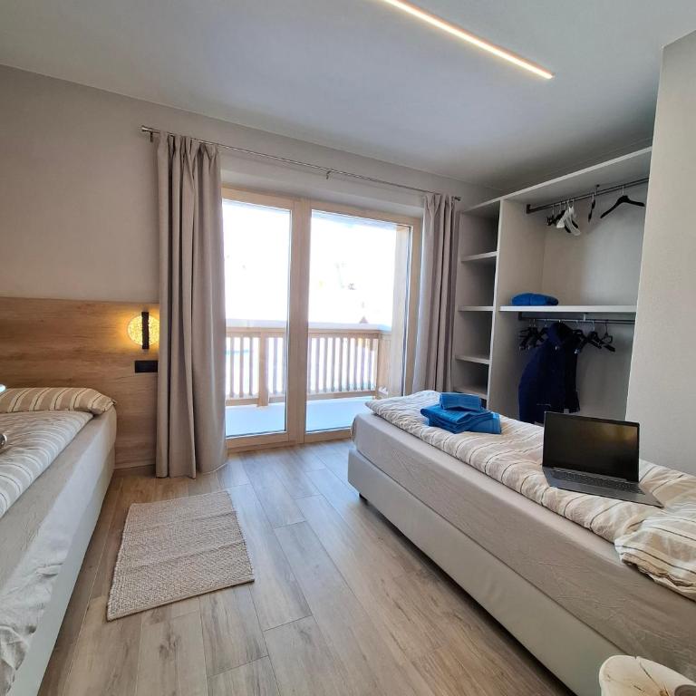 Appartamento Sbuffo Livigno - Appartamento Deluxe con 2 Camere da Letto e Vista Giardino - 24