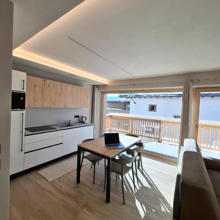 Appartamento Sbuffo Livigno - Appartamento Deluxe con 2 Camere da Letto e Vista Giardino - 13