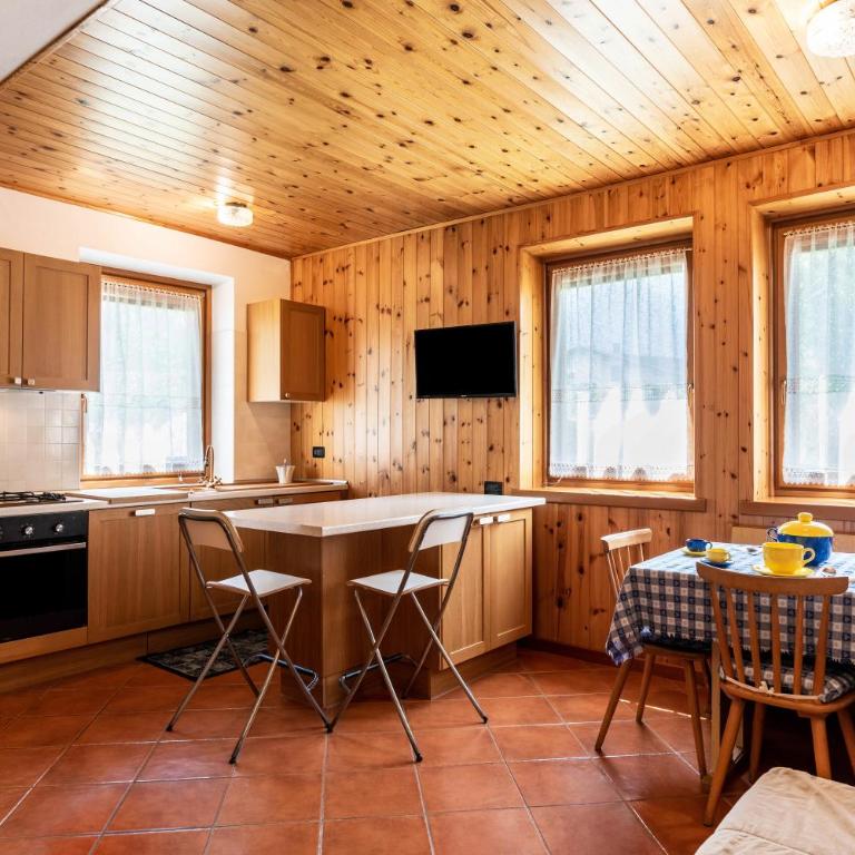 Appartamento Dolomiti Casa Lucia - Appartamento Deluxe con 2 Camere da Letto e Vista Giardino - 5