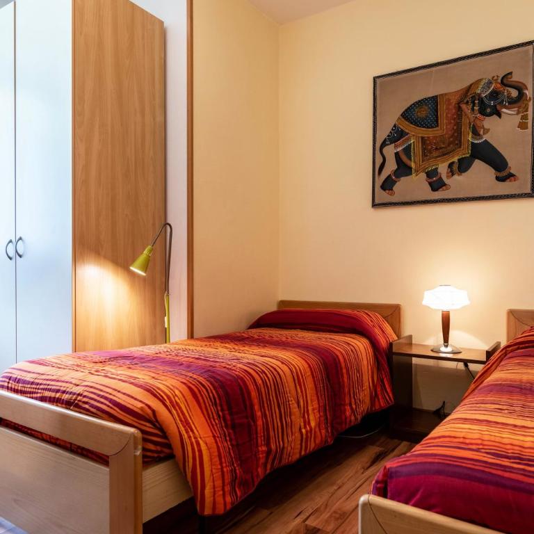 Appartamento Dolomiti Casa Lucia - Appartamento Deluxe con 2 Camere da Letto e Vista Giardino - 17