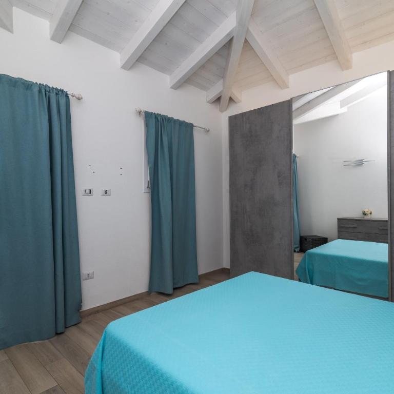 Attico con vista mare a Budoni - Appartamento Deluxe con 2 Camere da Letto e Vista Oceano - 11