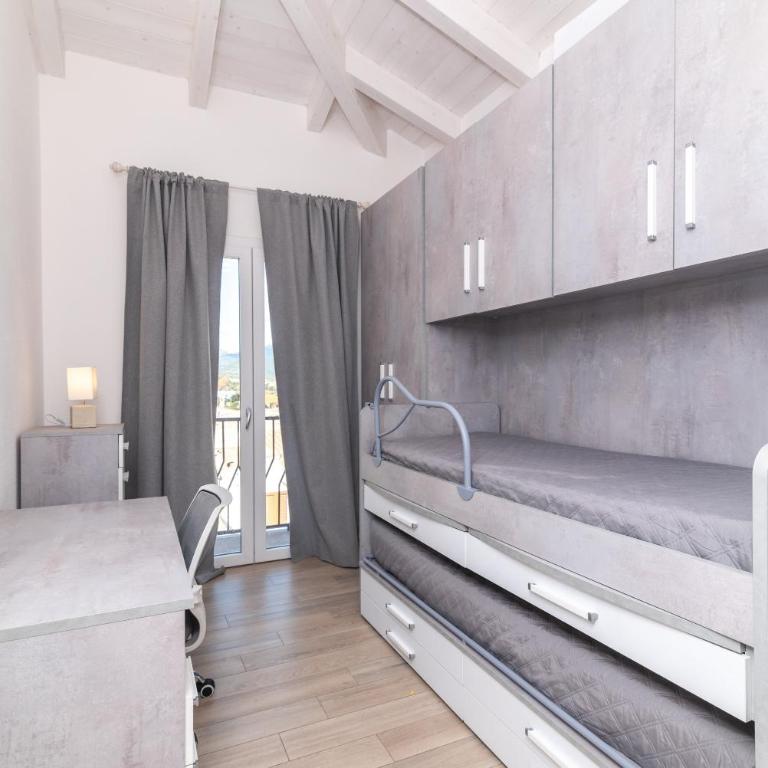 Attico con vista mare a Budoni - Appartamento Deluxe con 2 Camere da Letto e Vista Oceano - 12