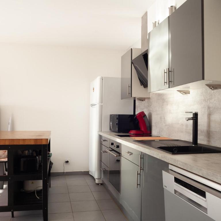 Appartement Evasion - Two-Bedroom Deluxe Apartment with Garden View - 8