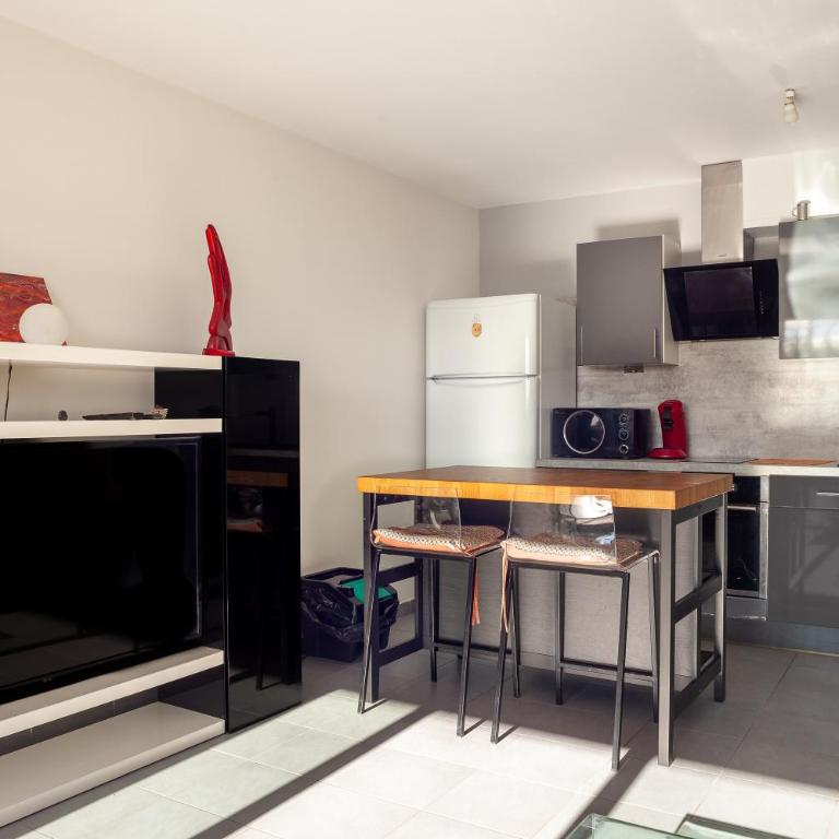 Appartement Evasion - Two-Bedroom Deluxe Apartment with Garden View - 5