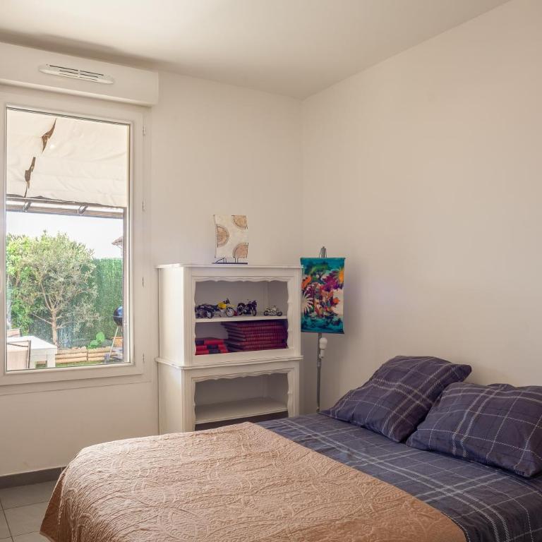 Appartement Evasion - Two-Bedroom Deluxe Apartment with Garden View - 11