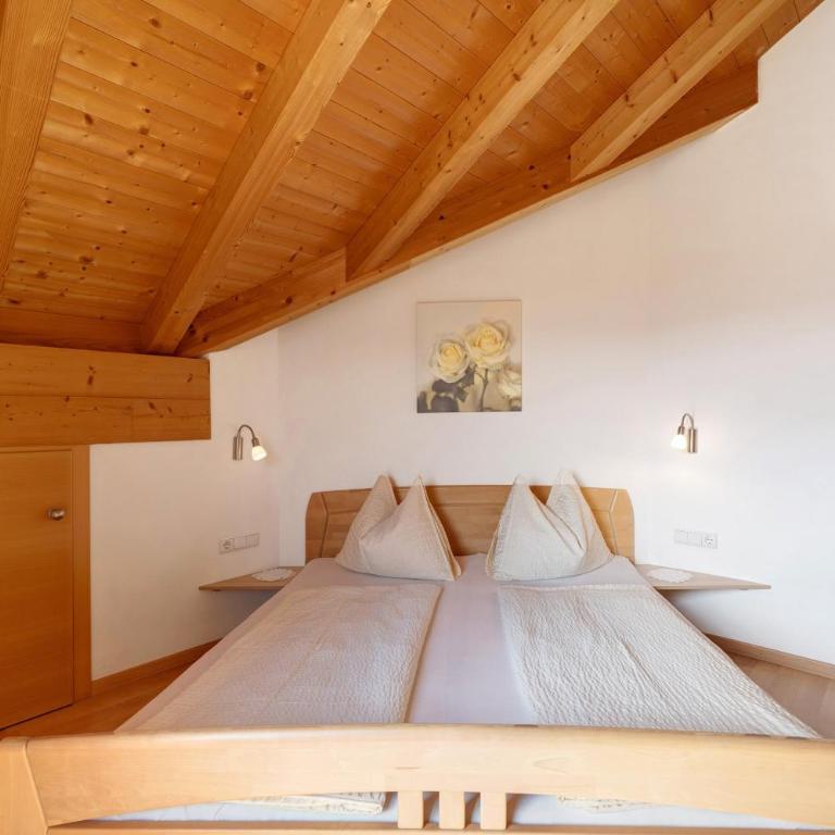 Stettnerhof Wohnung Penegal - Apartamento Deluxe de 2 dormitorios con vistas al jardín - 14