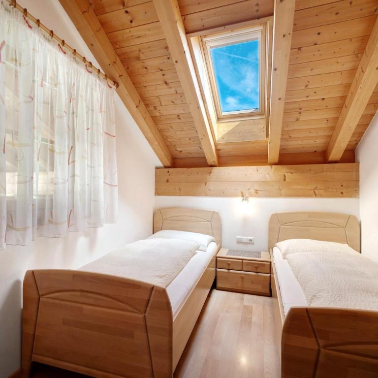 Stettnerhof Wohnung Penegal - Apartamento Deluxe de 2 dormitorios con vistas al jardín - 15