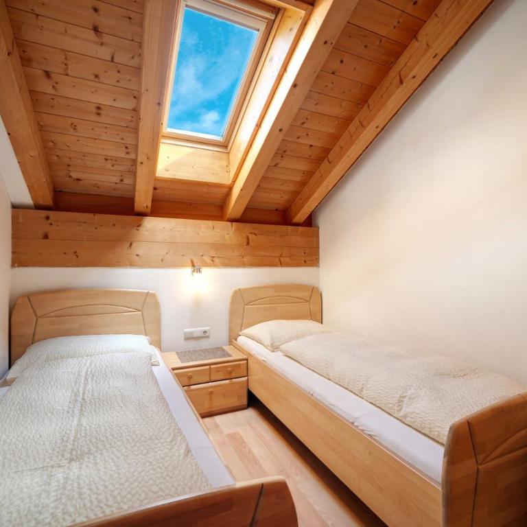 Stettnerhof Wohnung Penegal - Apartamento Deluxe de 2 dormitorios con vistas al jardín - 16