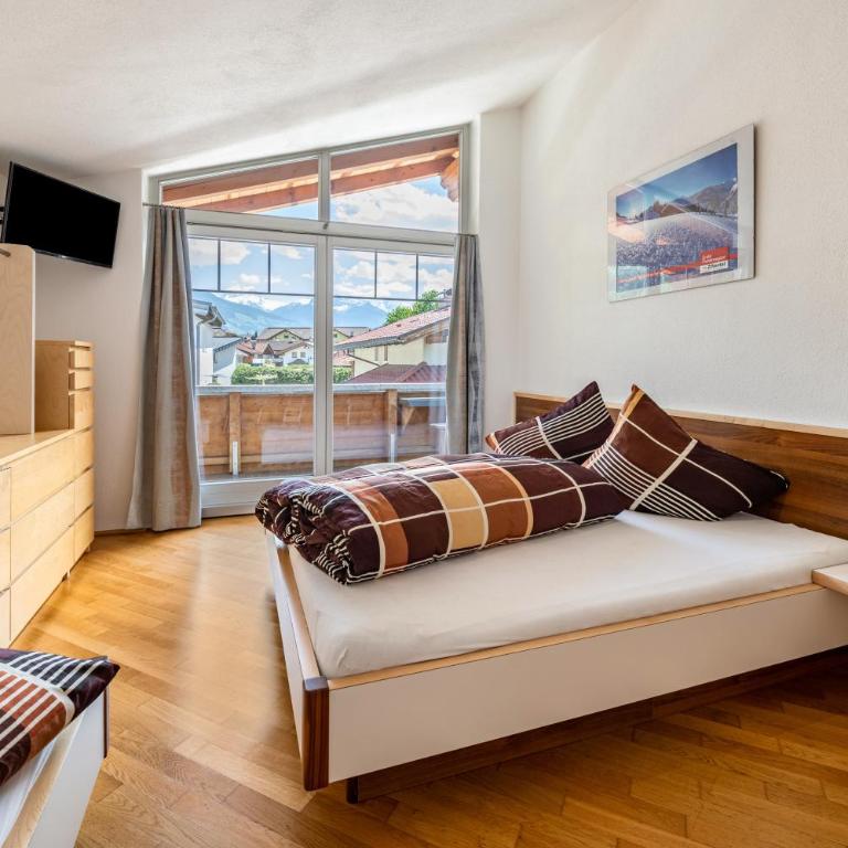 Haus Rudi - Premium Apartment mit 3 Schlafzimmern und Balkon - 12