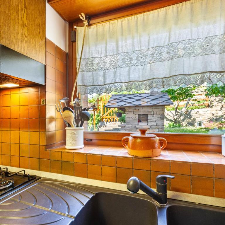 Casa Margherita - Appartamento con 1 Camera da Letto e con Giardino - 11