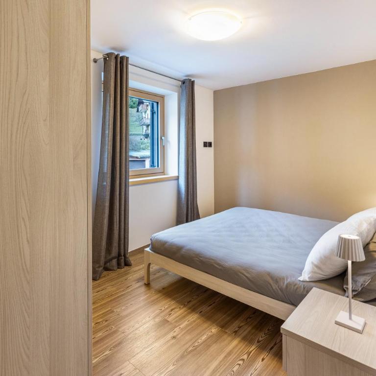 La Sorgente Ville di Fiemme - Two-Bedroom Deluxe Apartment with Garden View - 8