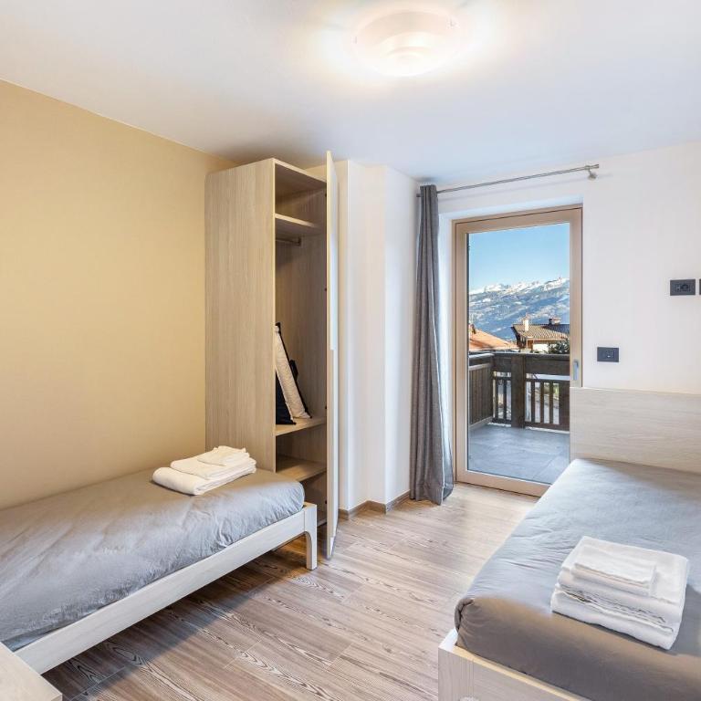La Sorgente Ville di Fiemme - Two-Bedroom Deluxe Apartment with Garden View - 10