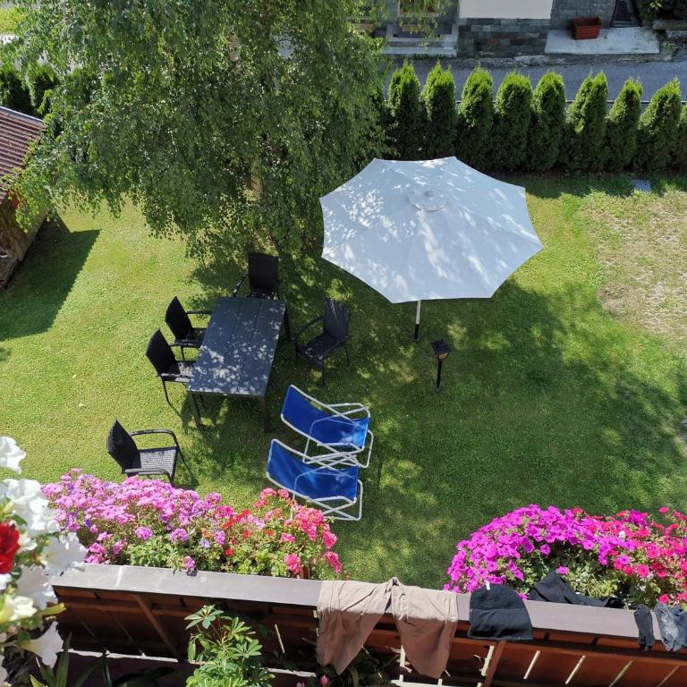 Appartamento Adamello Casa Lucia - Appartamento Deluxe con 2 Camere da Letto e Vista Giardino - 23