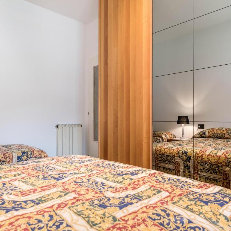 Appartamento Adamello Casa Lucia - Appartamento Deluxe con 2 Camere da Letto e Vista Giardino - 11