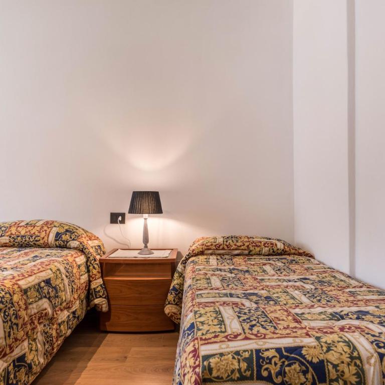 Appartamento Adamello Casa Lucia - Appartamento Deluxe con 2 Camere da Letto e Vista Giardino - 12