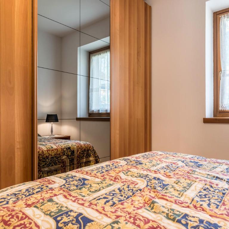Appartamento Adamello Casa Lucia - Appartamento Deluxe con 2 Camere da Letto e Vista Giardino - 10