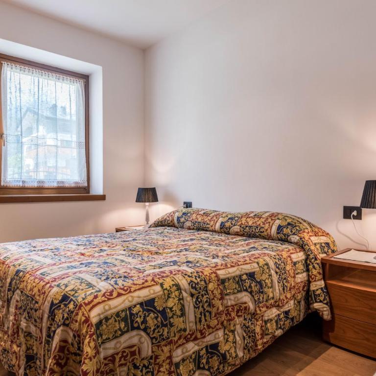 Appartamento Adamello Casa Lucia - Appartamento Deluxe con 2 Camere da Letto e Vista Giardino - 8
